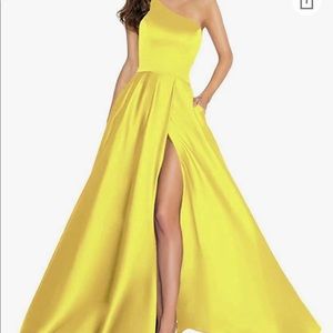Light yellow satin one shoulder gown w/high slit